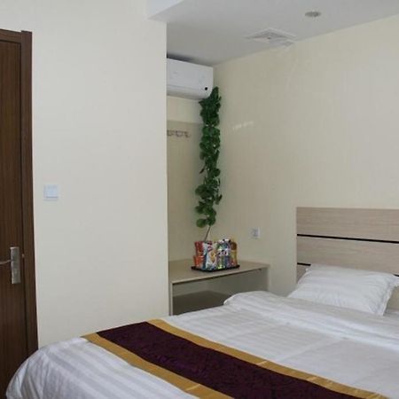 Dalian Kai Bin Business Inn Esterno foto