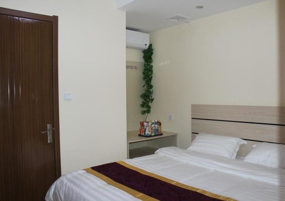 Dalian Kai Bin Business Inn Esterno foto