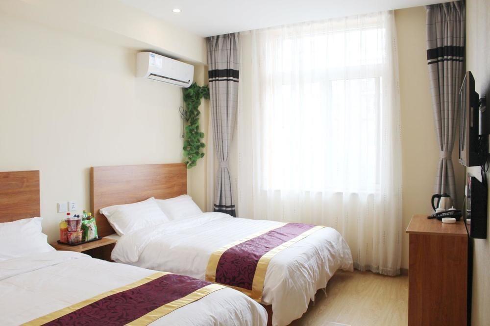 Dalian Kai Bin Business Inn Esterno foto