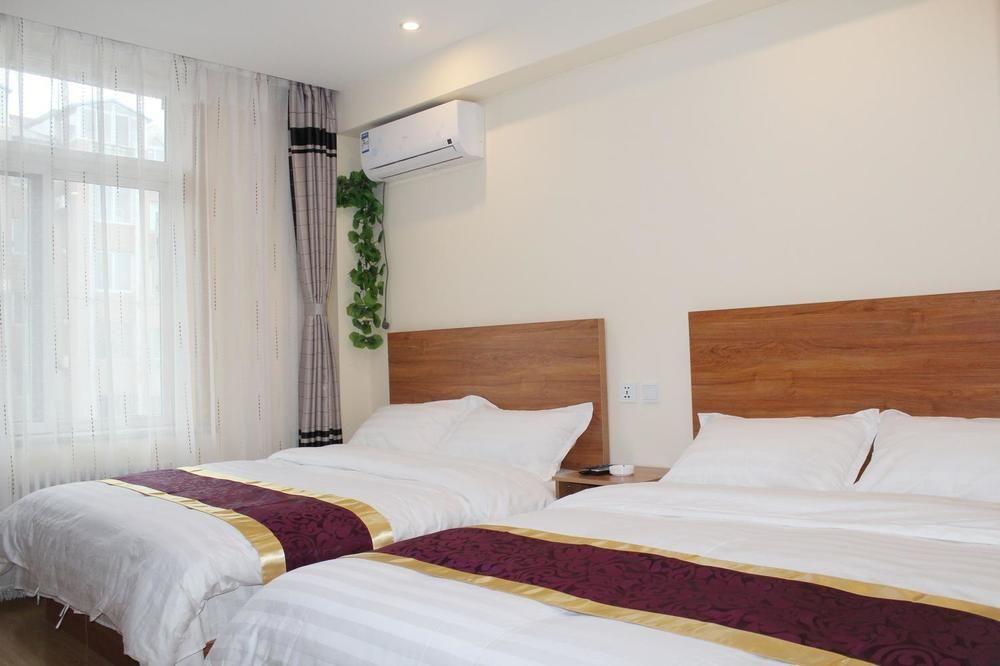 Dalian Kai Bin Business Inn Esterno foto