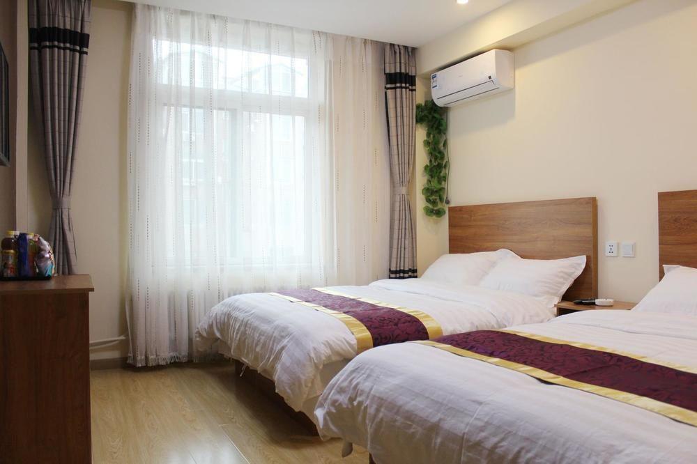 Dalian Kai Bin Business Inn Esterno foto