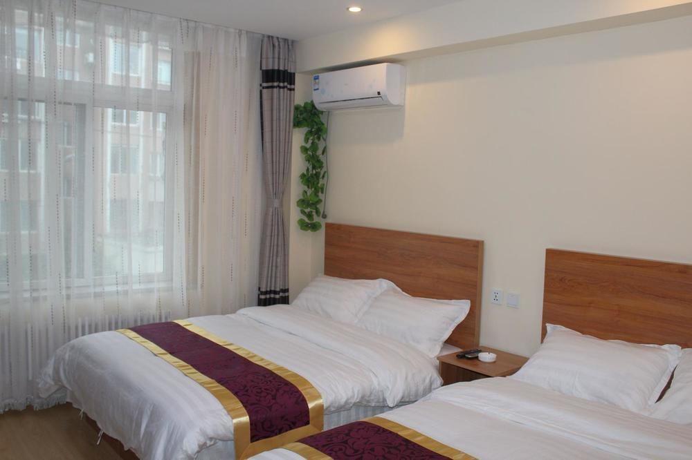 Dalian Kai Bin Business Inn Esterno foto