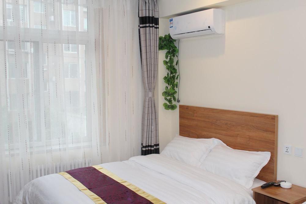 Dalian Kai Bin Business Inn Esterno foto
